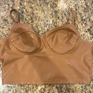 Soft leather, camel colored adjustable top